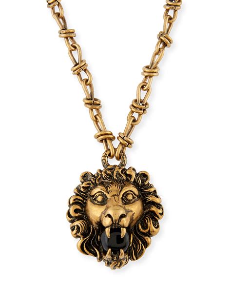 silver gucci lion pendant